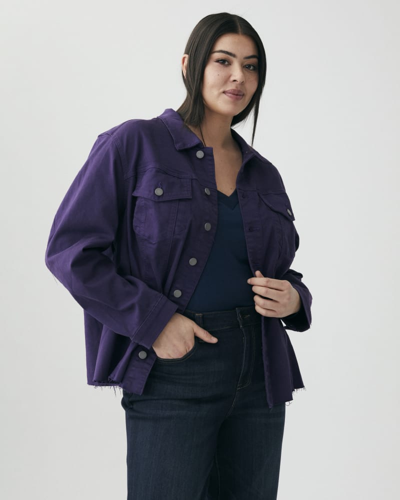 Front of a model wearing a size 1X Martha Raw-Hem Denim Jacket in Purple by Molly & Isadora. | dia_product_style_image_id:266881